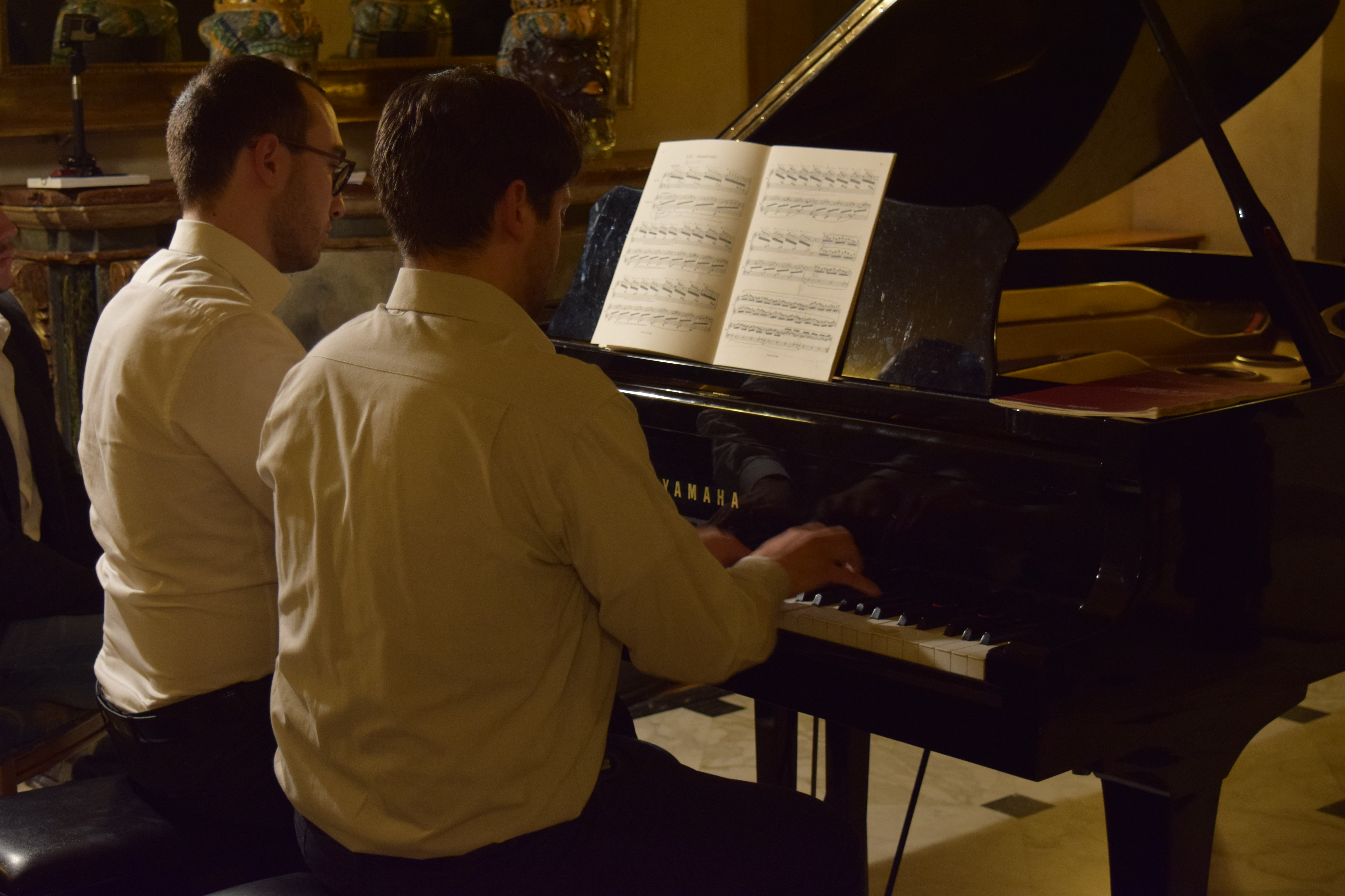 FERDIS Piano Duo performing at the piano